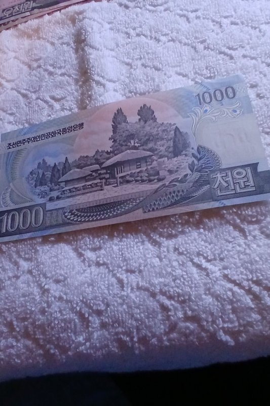 NORTH KOREA.2006.BANKNOTE OF 1000 WON.# OO.871495.UNCIRCULATED.