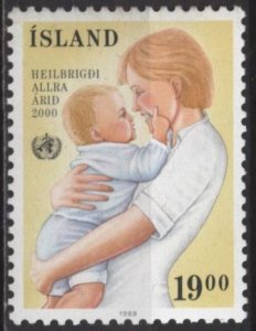 Iceland 668 (mnh) 19k WHO, 40th anniv.: mother and baby (1988)