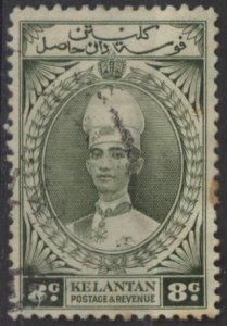 Malaya: Kelantan 34 (used, toning) 8c Sultan Ismail, gray green (1937)