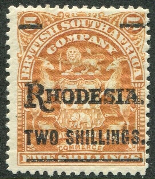 RHODESIA-1909-11 2/- on 5/- Orange Sg 118 MOUNTED MINT V48406