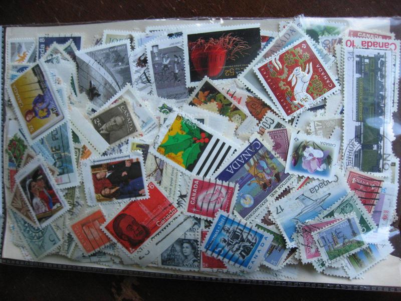 CANADA colossal mixture(duplicates,mixed cond)10,000 old,new,35%comems,65%defins