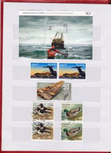 COLLECTION OF ICELAND STAMPS IN SMALL STOCK BOOK 90 STAMPS