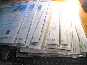 VARIO STAMP STOCK SHEETS - 16 UNOPENED PACKAGES OF 5 SHEETS EACH - 11 DIFFERENT 