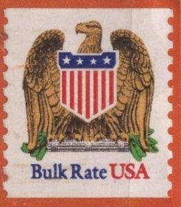 US 2602 (u on colored paper) (10¢) eagle & shield, bulk rate in blue (1991)
