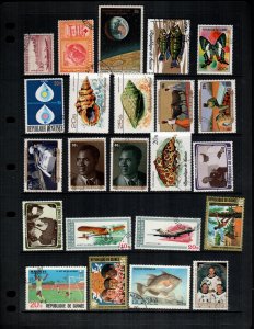 Guinea  23 different  used and mint hinged