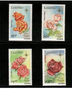 Lesotho 1995 - Christmas Flowers Art - Set of 4 Stamps - Scott #1040-3 - MNH