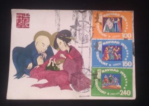 C) 1974, URUGUAY, AIR MAIL, MULTIPLE STAMPS, ASIAN RELIGIOUS ART AT CHRISTMAS,