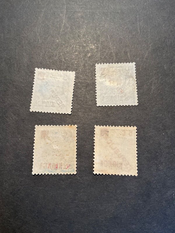 Kionga Scott #1-4 hinged