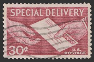 UNITED STATES STAMP. 1957. SCOTT # E21. USED. # 3