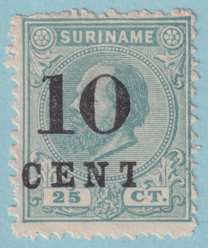 SURINAM 34 - BROKEN T VARIETY - MINT NO GUM AS ISSUED - VERY FINE! - TBV