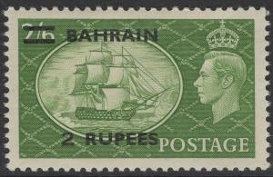 BAHRAIN SG77 1951 2r ON 2/6 YELLOW-GREEN OVPT ON GB MTD MINT
