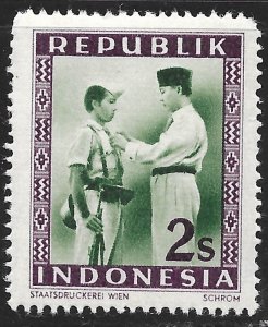 Indonesia #31 2s Soekarno Decorating Soldier ~ MNH