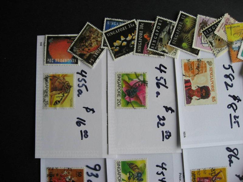 Singapore 50 different stamps plus $100 catalogue value of high values too!