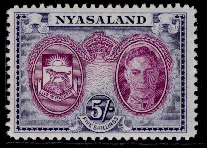 NYASALAND PROTECTORATE GVI SG155, 5s purple & blue, M MINT.