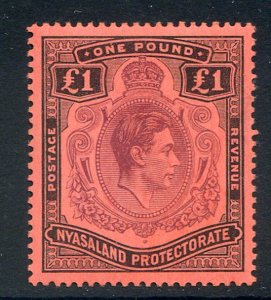 Nyasaland £1 Purple and Black/Red SG143 Mounted Mint