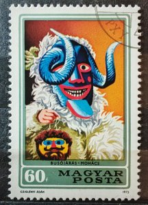 Hungary. A used postage stamp (60 F from 1973). It depicts a mask associated...