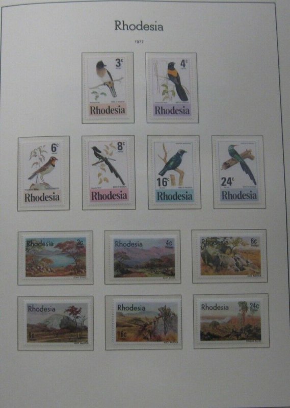 RHODESIA 1924-1977, in Tudor Hingeless album, used & mint, Scott $620.00