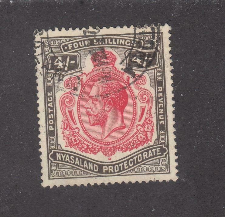 NYASALAND # 21 VF-KGV 4sh LIGHT USED CAT VALUE $75+