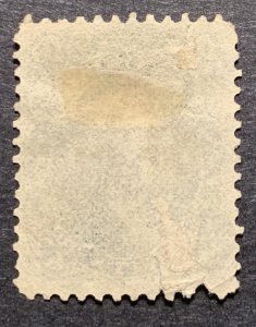 #68 – 1861 10c Washington, yellow green.  Used small tare on bottom perf.