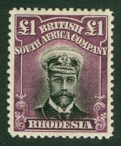 SG 242 Rhodesia £1 black & reddish-purple. A fresh mounted mint example CAT £400