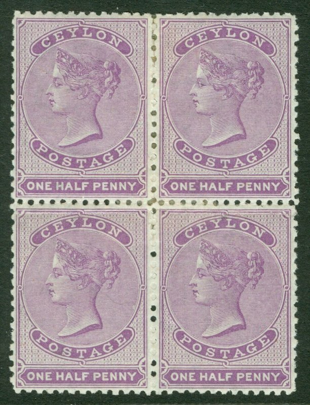 SG 48b Ceylon 1863-66. ½d reddish-lilac. Fresh mint block of 4, some re-joined..