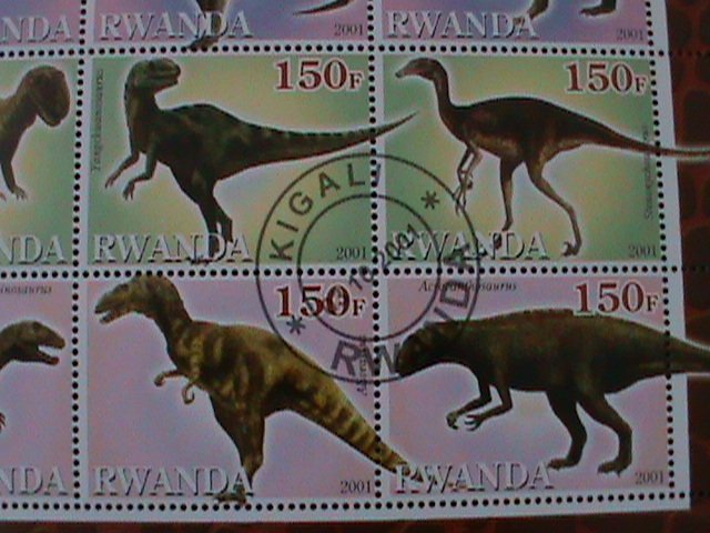 RWANDA-2001-16 DIFFERENT WORLD FAMOUS DINOSAURES CTO LARGE SHEET VERY FINE