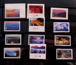 US  - ASSORTMENT 12 AIR MAIL STAMPS - MNH - CAT VAL $32.25