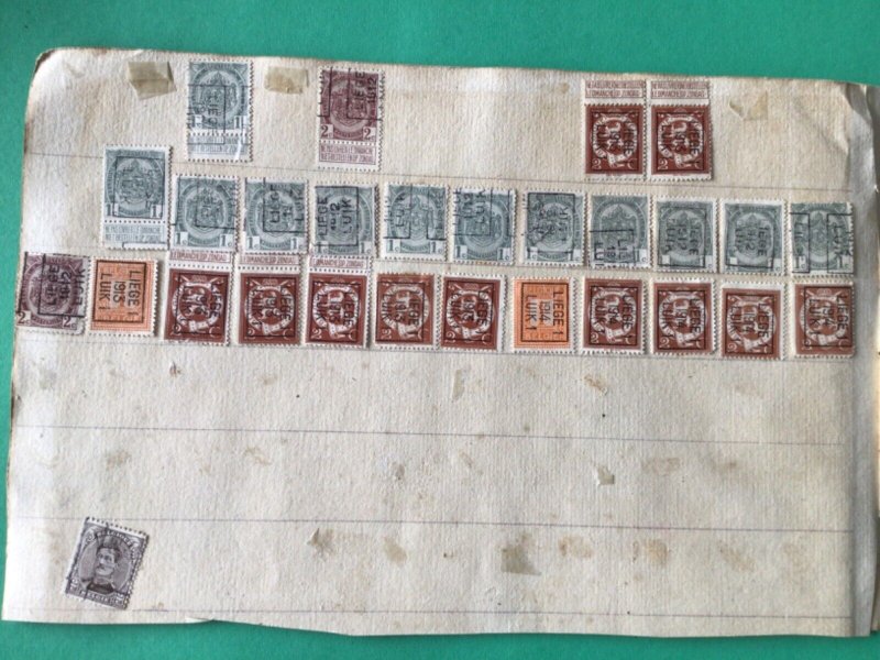 Belgium pre cancel stamps on old album part pages Ref A8461