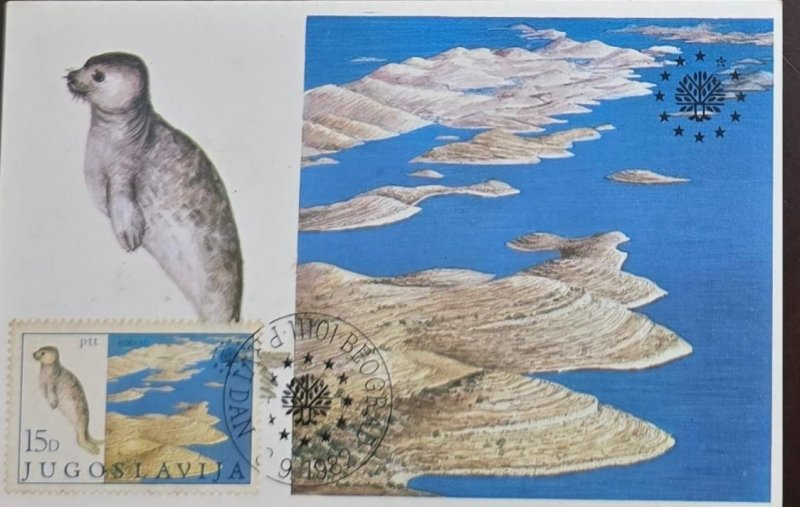 KV) 1988 YUGOSLAVIA, COVER WITH ILLUSTRATION OF A MONK SEAL AND THE ROCKY ISLAND