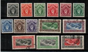 Zanzibar Scott 230-43 Mint hinged and used (Catalog Value $57.70)