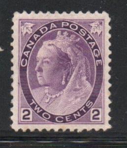 Canada Sc  76 1898 2c purple Victoria Numeral issue stamp mint