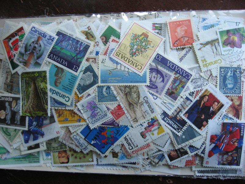 CANADA colossal mixture(duplicates,mixed cond)10,000 old,new,35%comems,65%defins