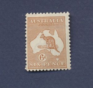 AUSTRALIA - Scott 49 - watermark 10 - unused hinged - 6p yellow brown - 1923