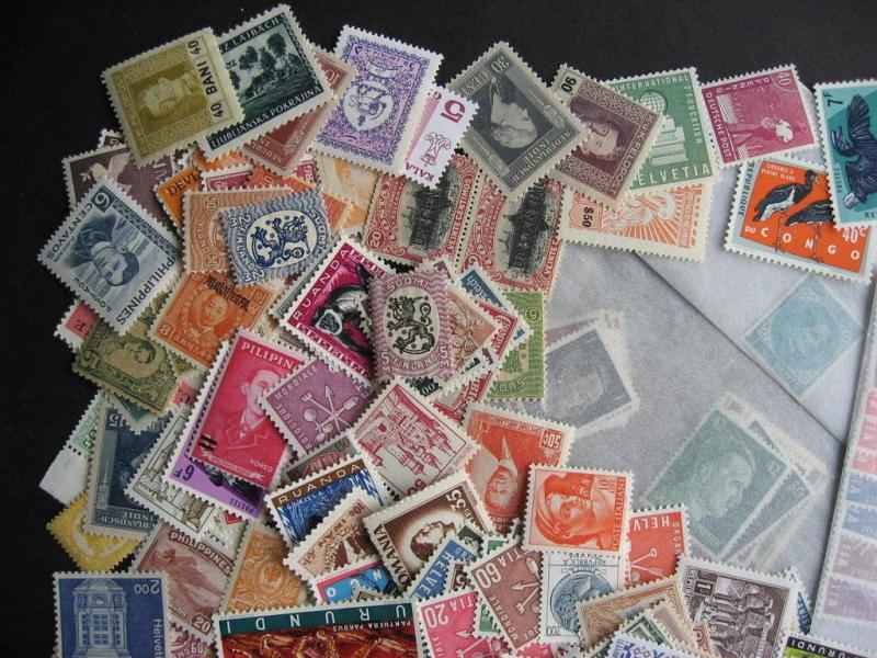 Scrap pile of 290 MNH worldwide. Duplicates, mixed condition, what lurks?