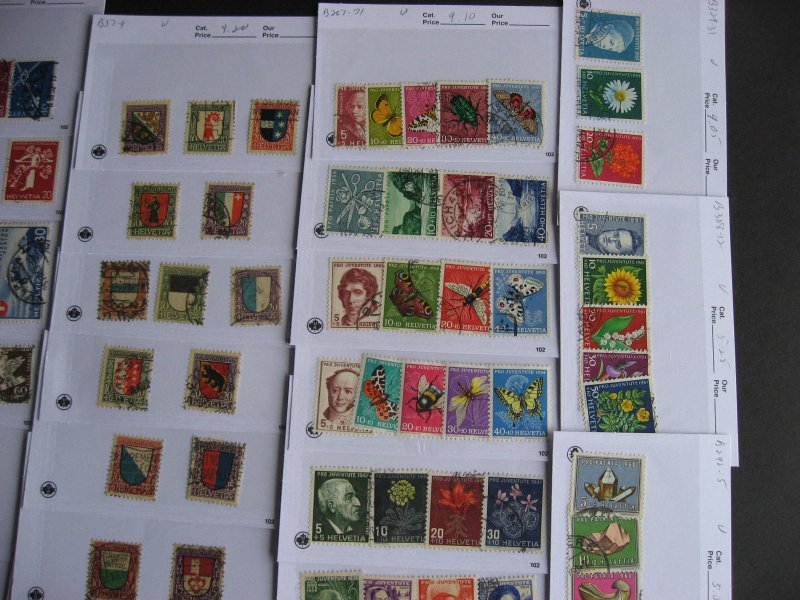 Switerland older stamps assembled in sales cards with better,worth checking out