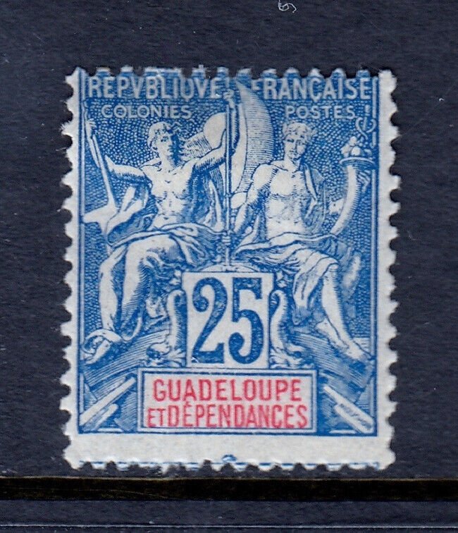GUADELOUPE — SCOTT 38 — 1900 25c BLUE NAVIGATION & COMMERCE — MH — SCV $100