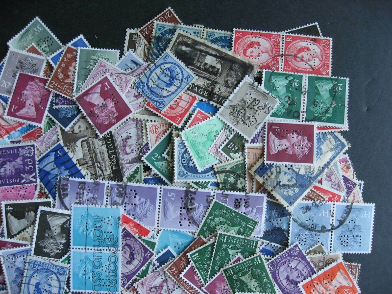 Great Britain 600 perfins QEII era mixture (duplicates, mixed condition)