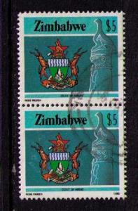 ZIMBABWE Sc# 514 USED FVF PAIR Coat of Arms $5