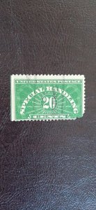 US Scott # QE3; 20c Special Handling stamp from 1928; Fine centering; damaged