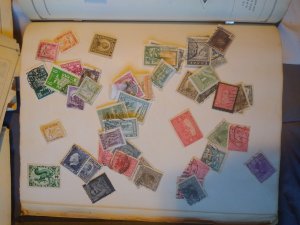 Two international junior postage stamp albums with 1000+ stamps inside