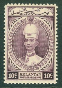 SG 46 Kelantan 1937-40. 10c purple. Lightly mounted mint CAT £45