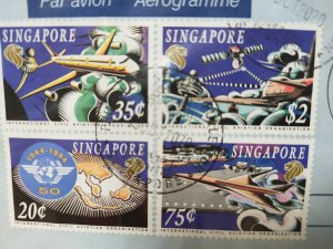 JERSEY1976 10p  U/A REGISTERED AEROGRAM  WITH  SINGAPORE STAMP SET.