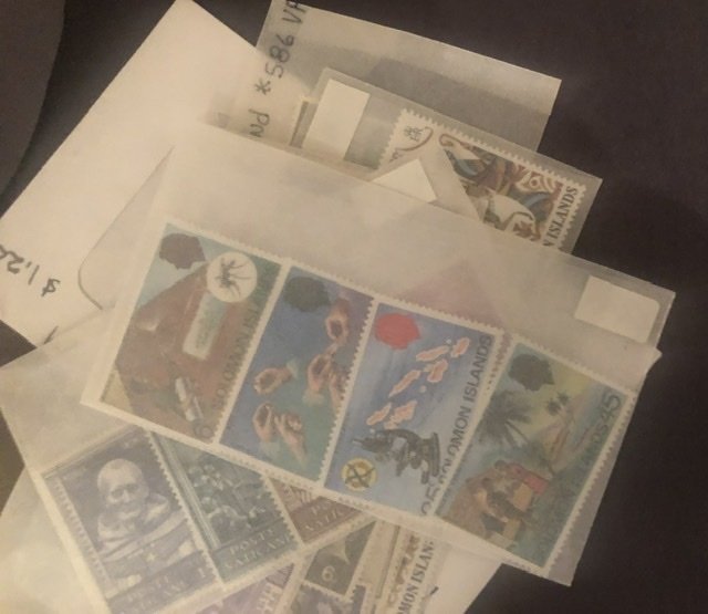 Lot of International Stamps In Glass Scenes Some Have Nice Value