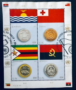 United Nations NY #1103a, b, e and f. 49¢ Flags and Coins (2015). Used.