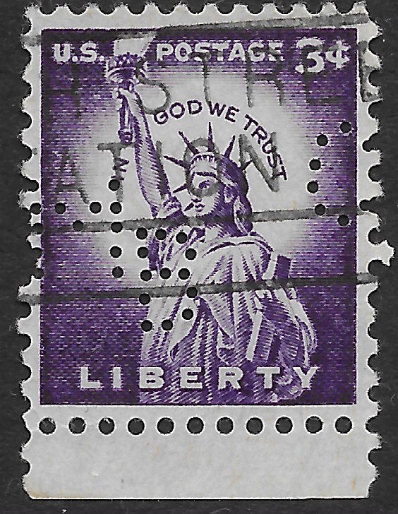 US #1035  used.   Perfin.  Lady Liberty.  In God We Trust.
