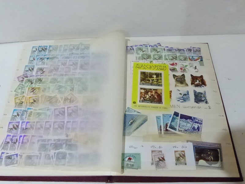 Dealers stock of Yemen stamps in Brown stockbook 