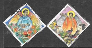 Zambia #645 & 64 Saints   (U)  CV$2.35