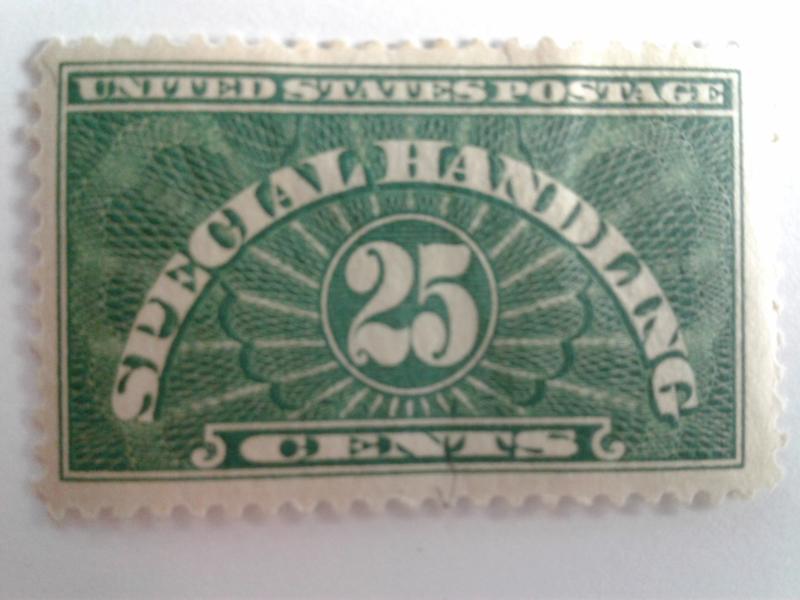 SCOTT # QE-4 25 CENT SPECIAL HANDLING MINT HINGED