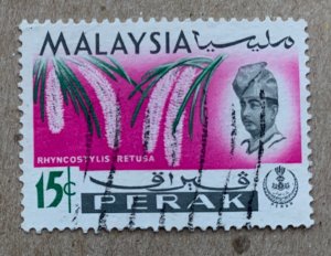 Perak 1965 15c Orchid, used. Scott 144, CV $0.25. SG 168