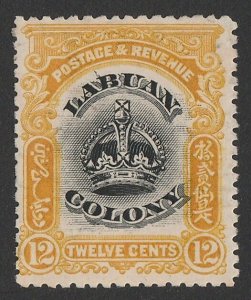 LABUAN 1902 Crown 12c black & yellow, variety 'line through B'.